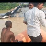 Indian Air Force helicopter crashed in floodwaters of Muzaffarpur during relief operations, with all crew members safe.