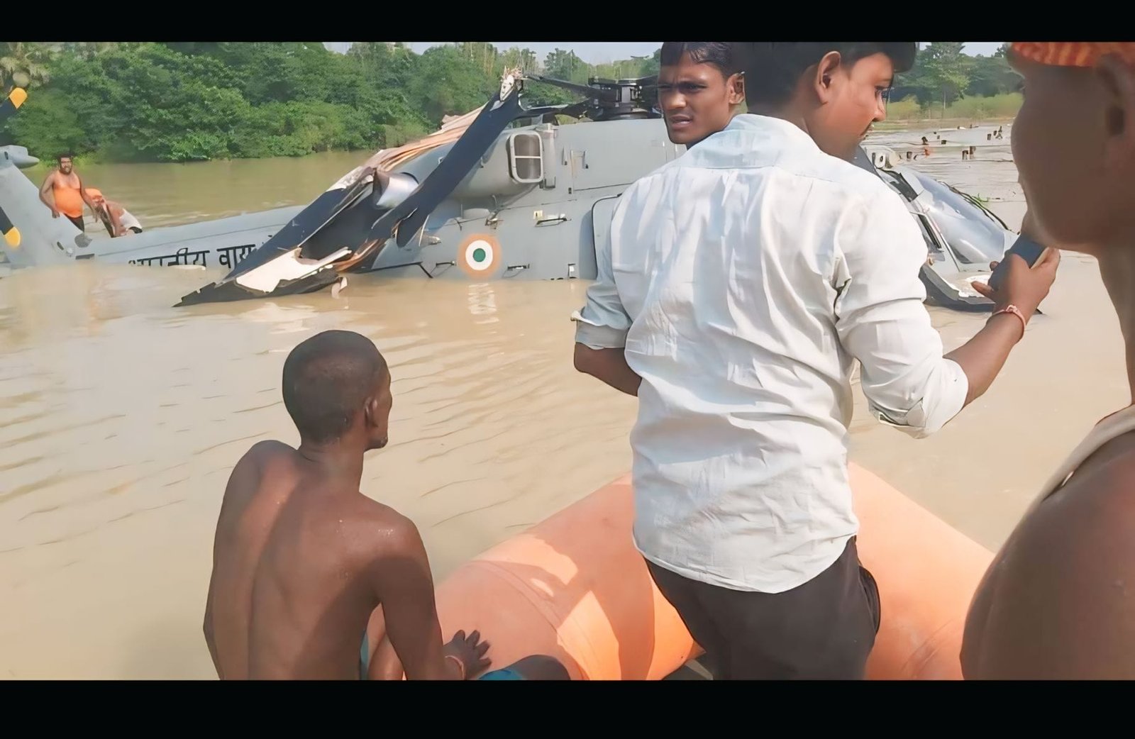 Indian Air Force helicopter crashed in floodwaters of Muzaffarpur during relief operations, with all crew members safe.